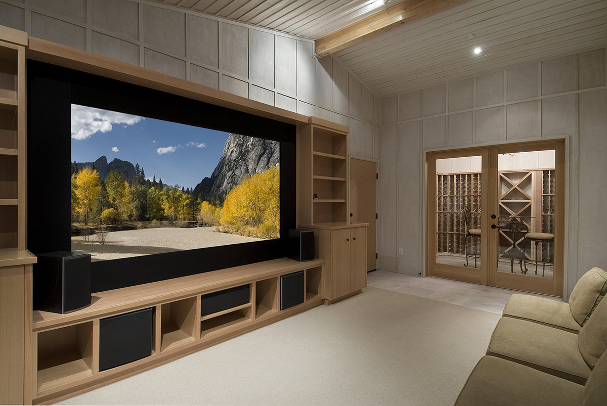 Home theater with acoustic tile on walls